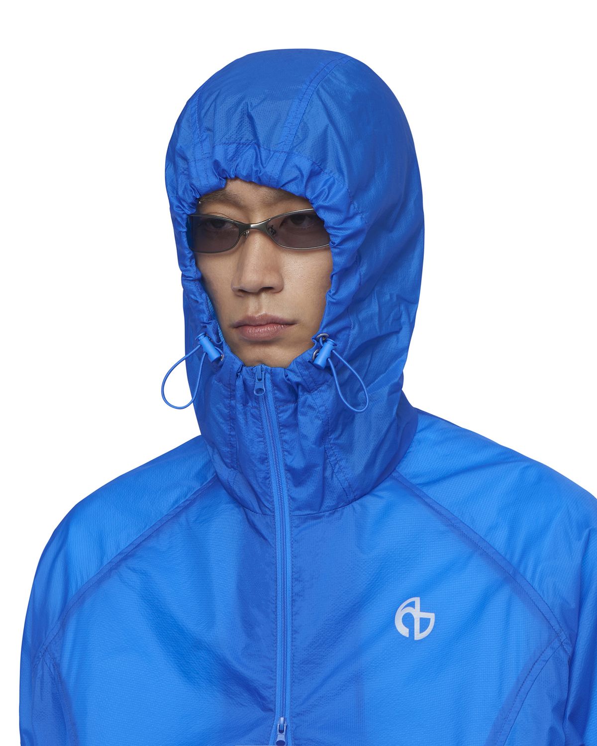노매뉴얼(NOMANUAL) TRANSLUCENT HOODED JACKET - BLUE