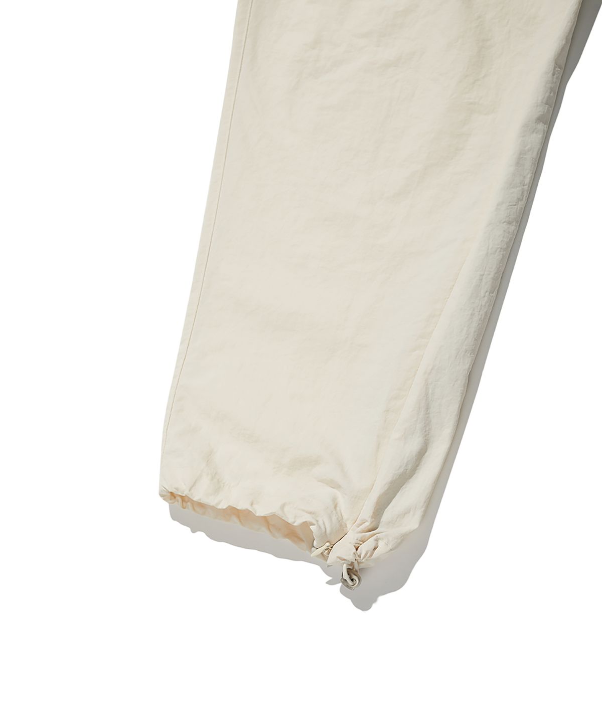 크리틱(CRITIC) Slash Shell Pants Light Beige