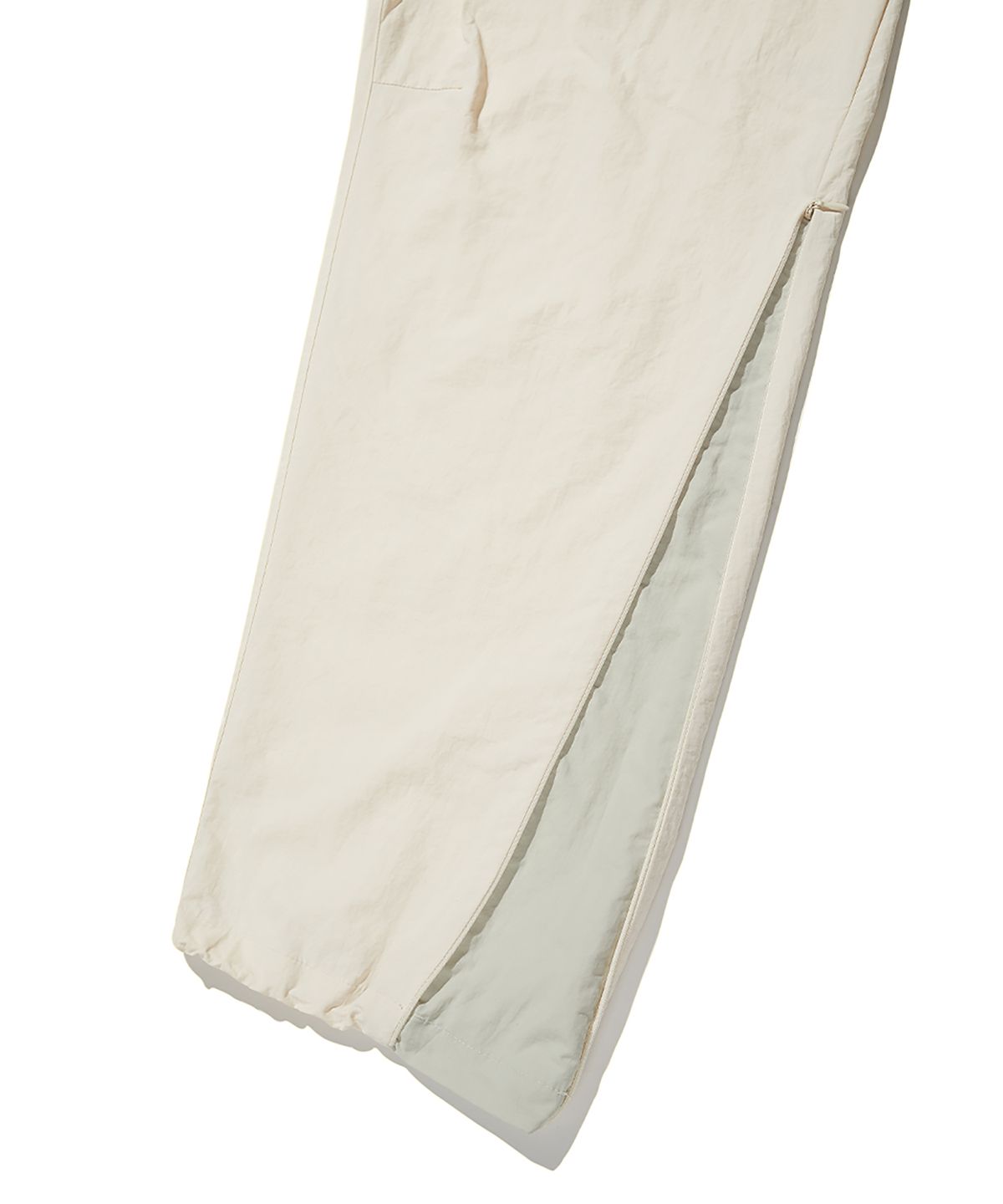 크리틱(CRITIC) Slash Shell Pants Light Beige