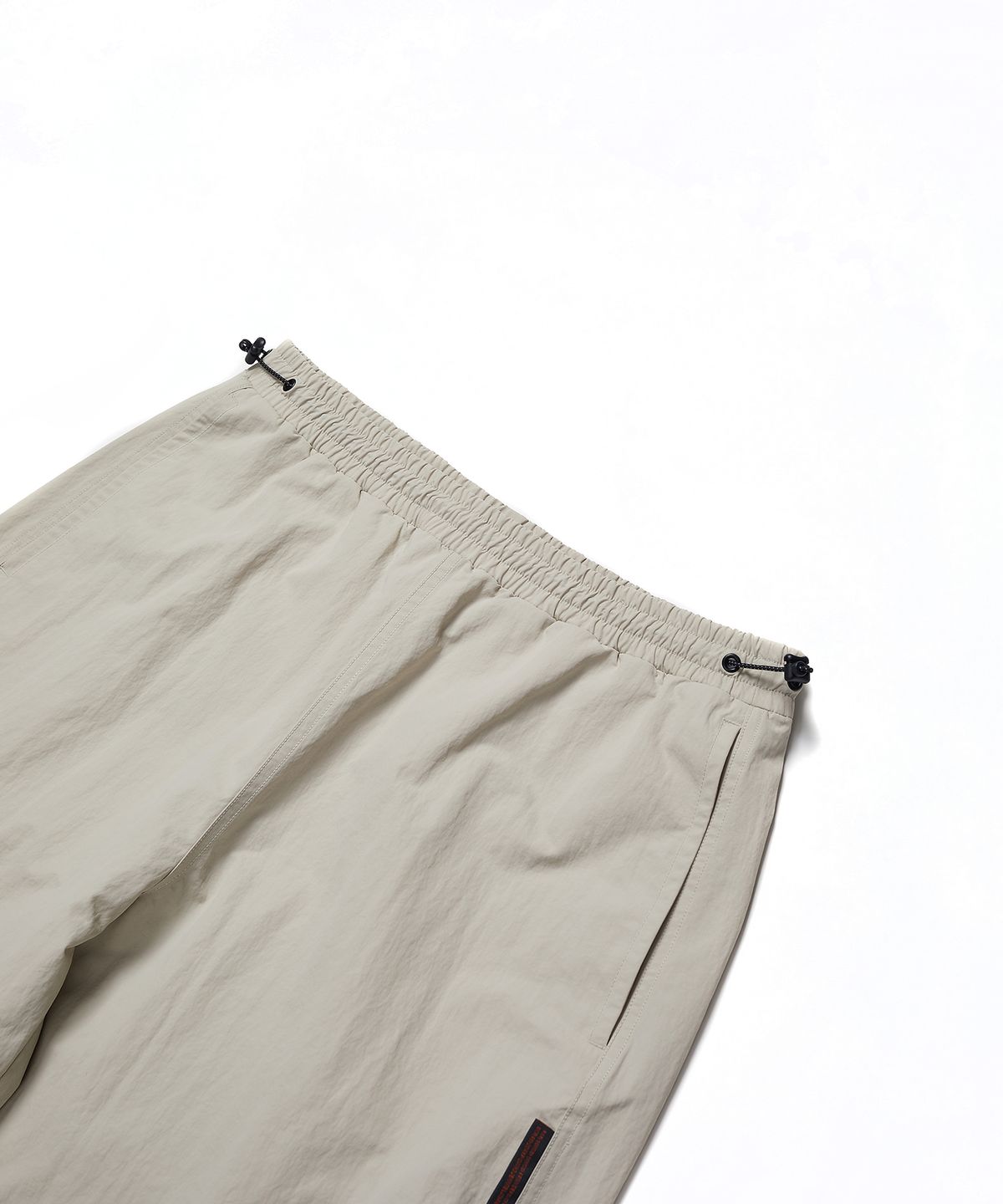 사운즈라이프(SOUNDSLIFE) Hard shell Parachute Pants Ivory