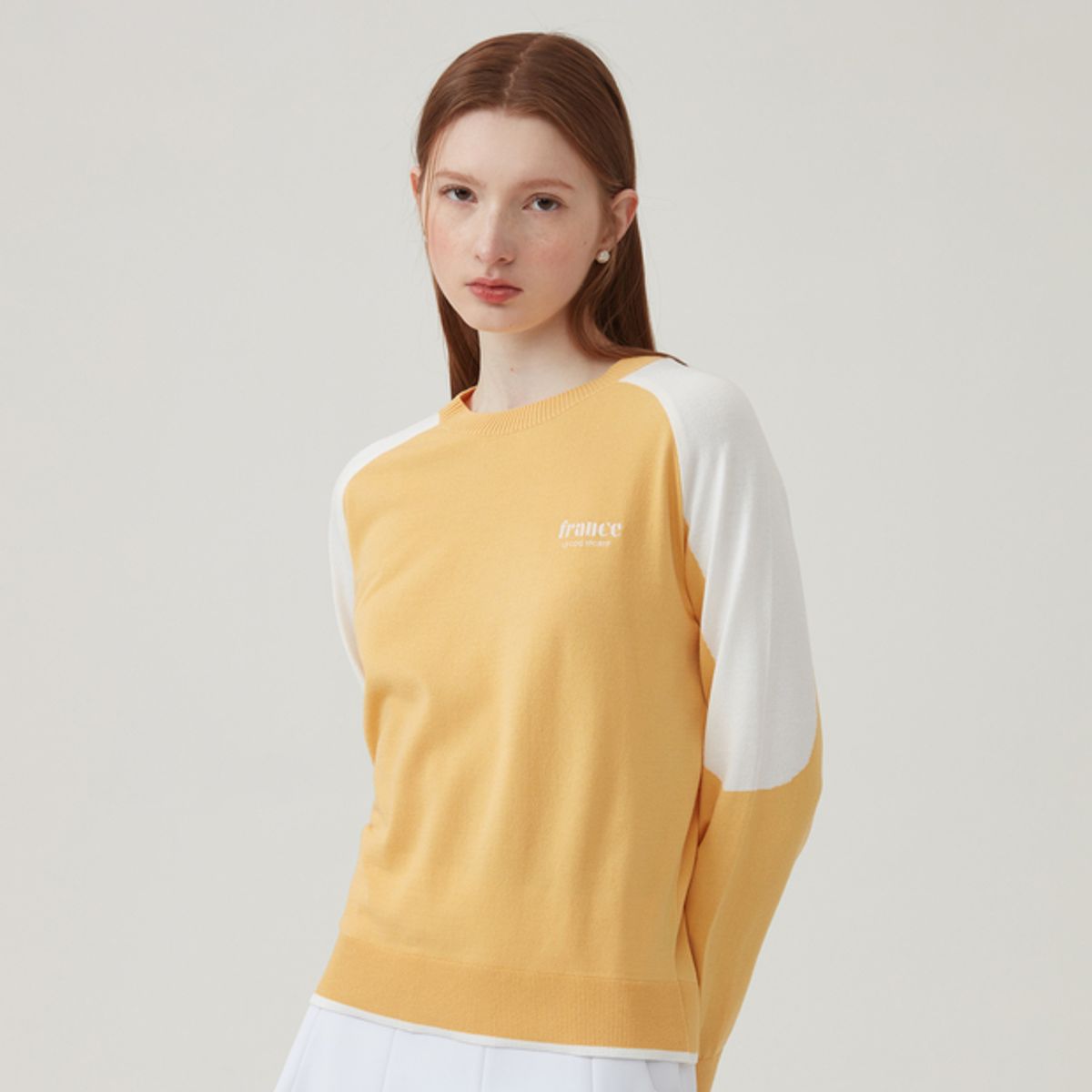 르꼬끄 골프(LECOQ GOLF) 래글런 소매배색 라운드 니트