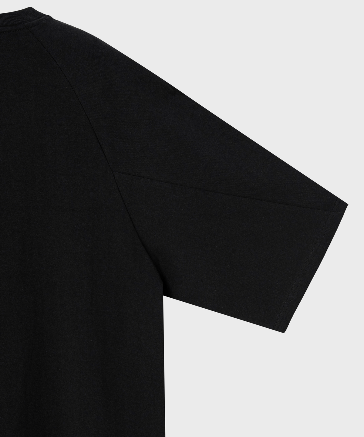넌블랭크(NONBLANK) 래글런 하프 슬리브 티셔츠_BLACK