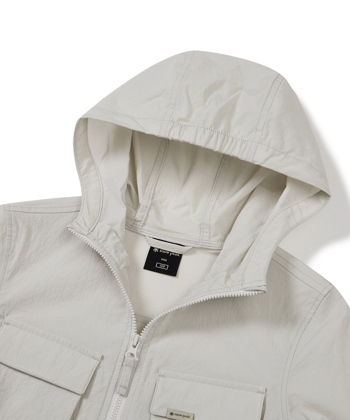 스노우피크 어패럴 키즈(SNOWPEAK APPAREL KIDS) 키즈 루트 아웃포켓 바람막이 Light Beige (S23MKRWB85)