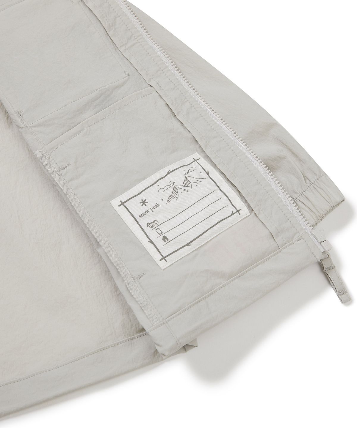 스노우피크 어패럴 키즈(SNOWPEAK APPAREL KIDS) 키즈 루트 아웃포켓 바람막이 Light Beige (S23MKRWB85)