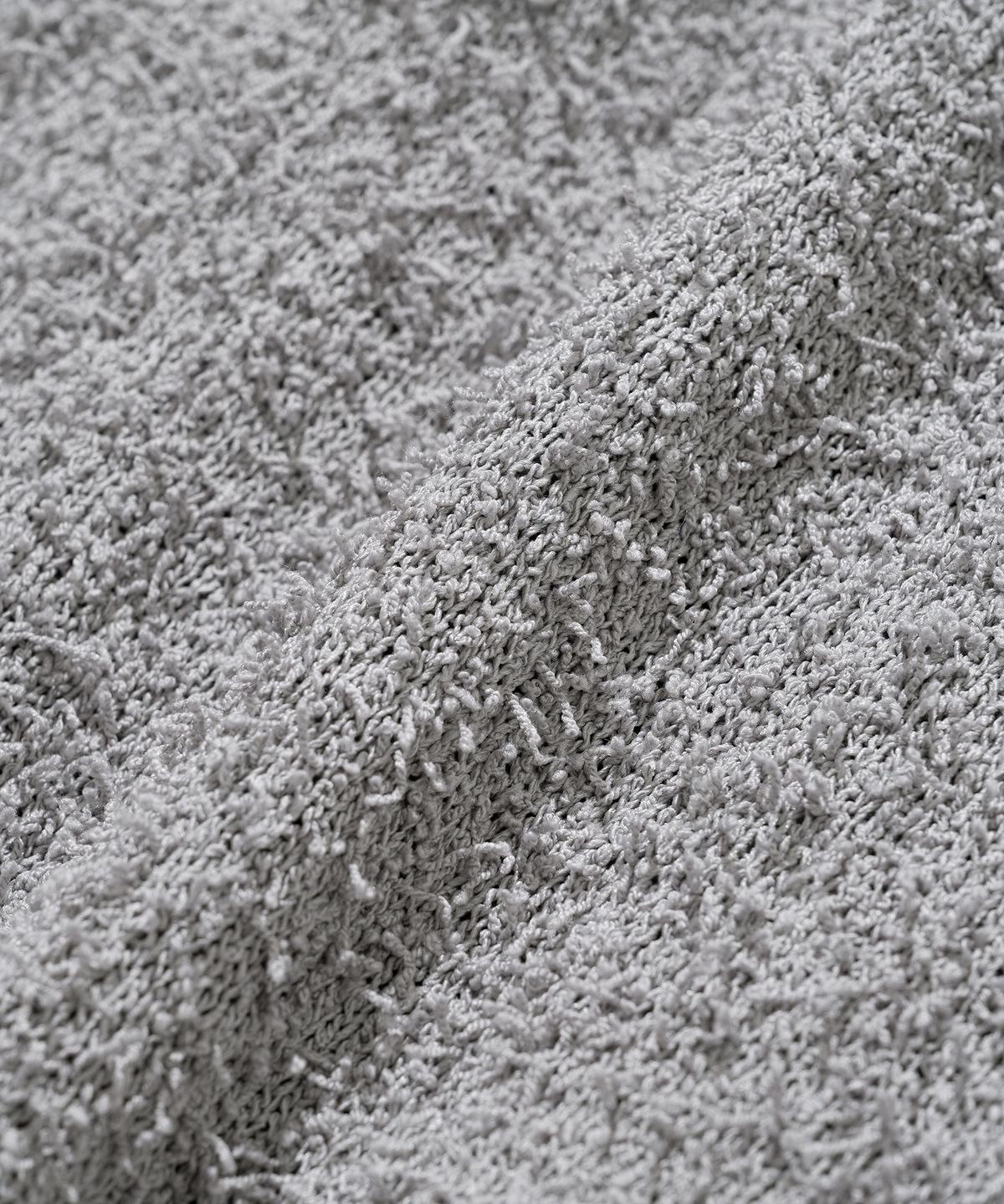 니티드(KNITTED) 테일 후디 니트 GREY