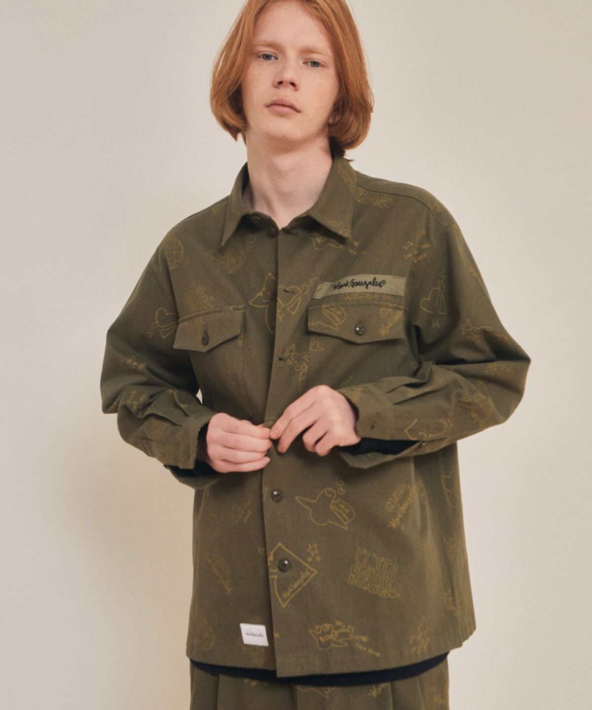 마크곤잘레스(MARK GONZALES) ALLOVER PRINT TWILL WORK JACKET - KHAKI