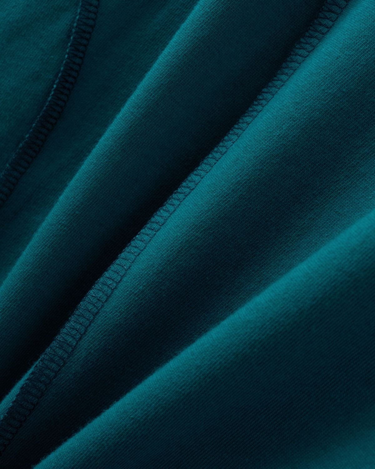 비슬로우(BESLOW) REVERSE OVERLOCK STITCH HALF T-SHIRTS TEAL