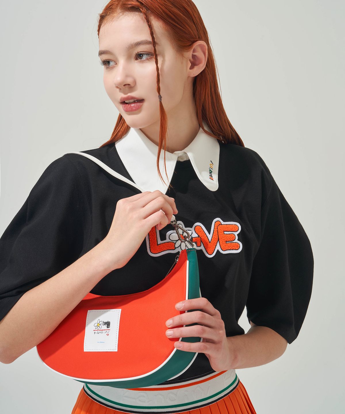 칸디니(KANDINI) 오렌지 컬러 호보백