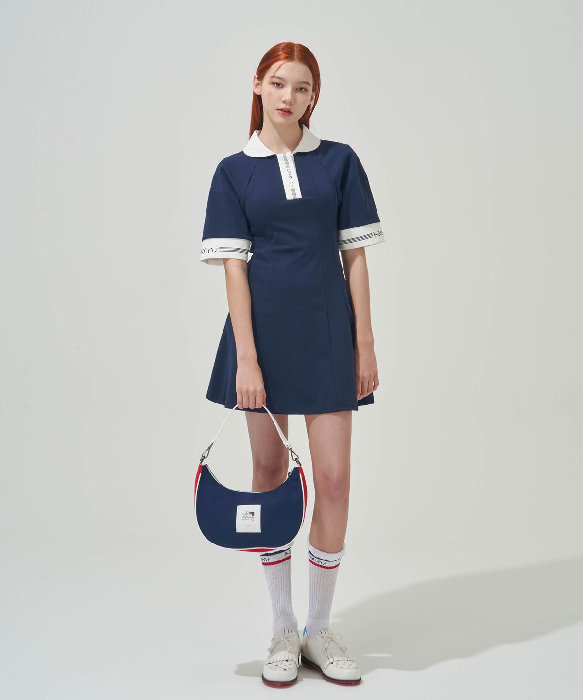 칸디니(KANDINI) 네이비 컬러 호보백