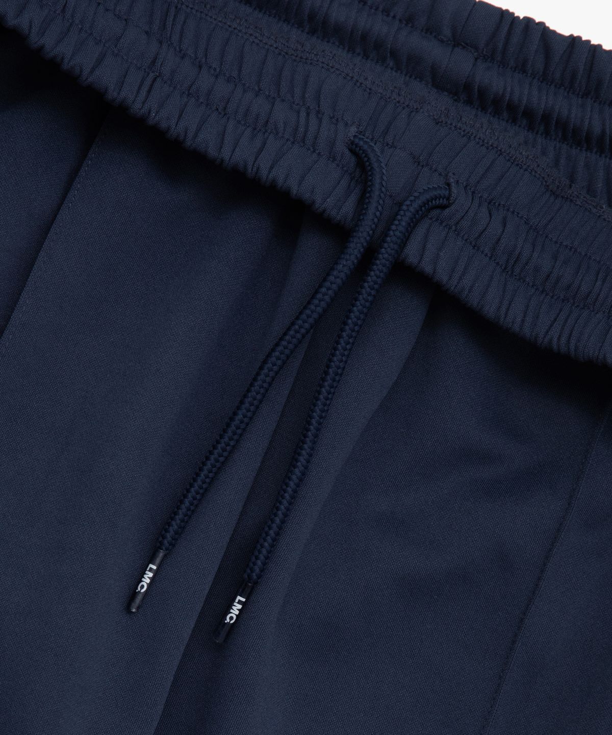 엘엠씨(LMC) SIDE STRIPED JERSEY TRACK PANTS navy