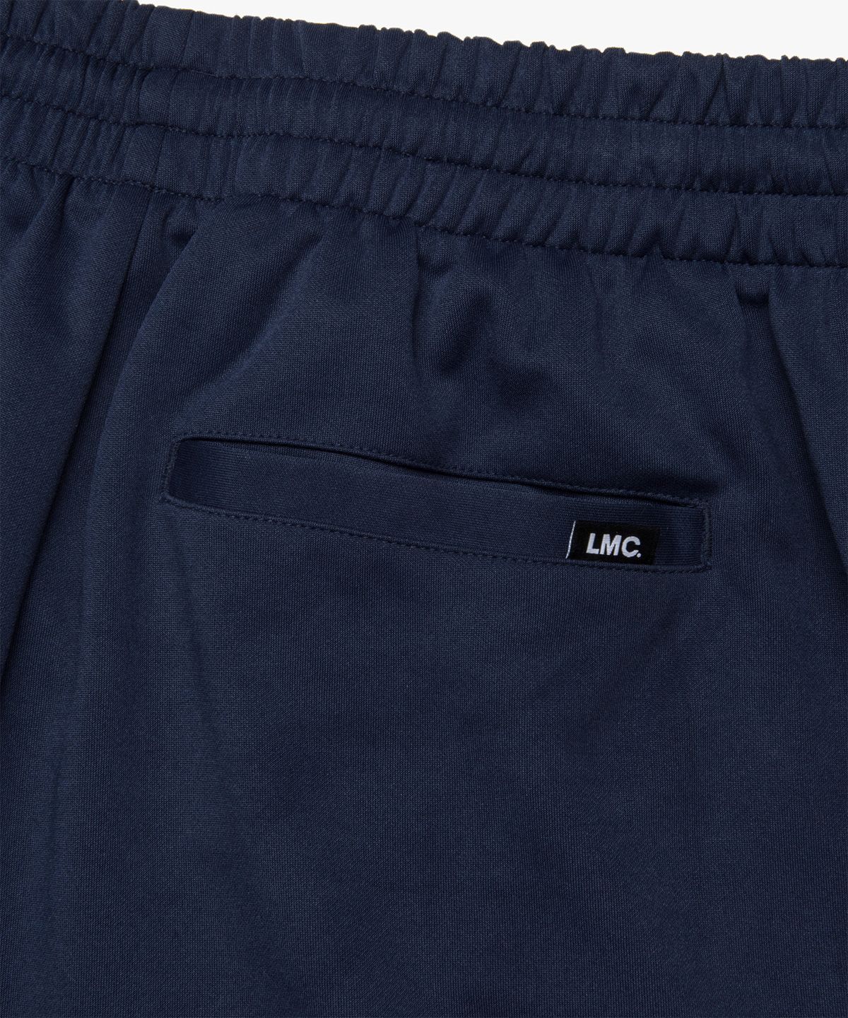 엘엠씨(LMC) SIDE STRIPED JERSEY TRACK PANTS navy