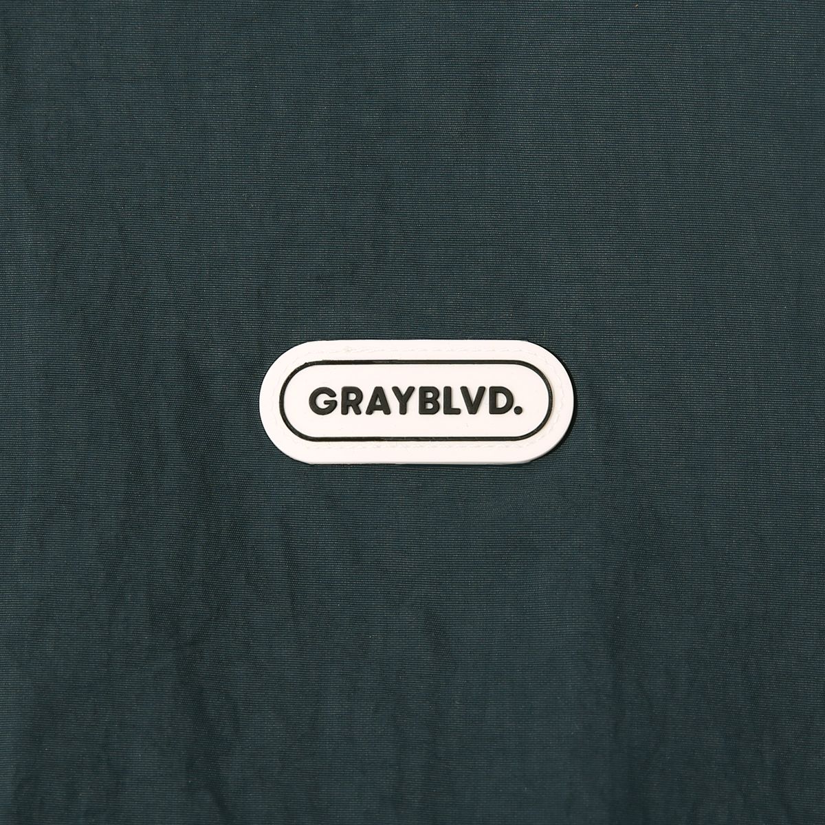 그레이블러밧(GRAYBLVD) 바스투 파이핑 바람막이 (BLUEGREEN)
