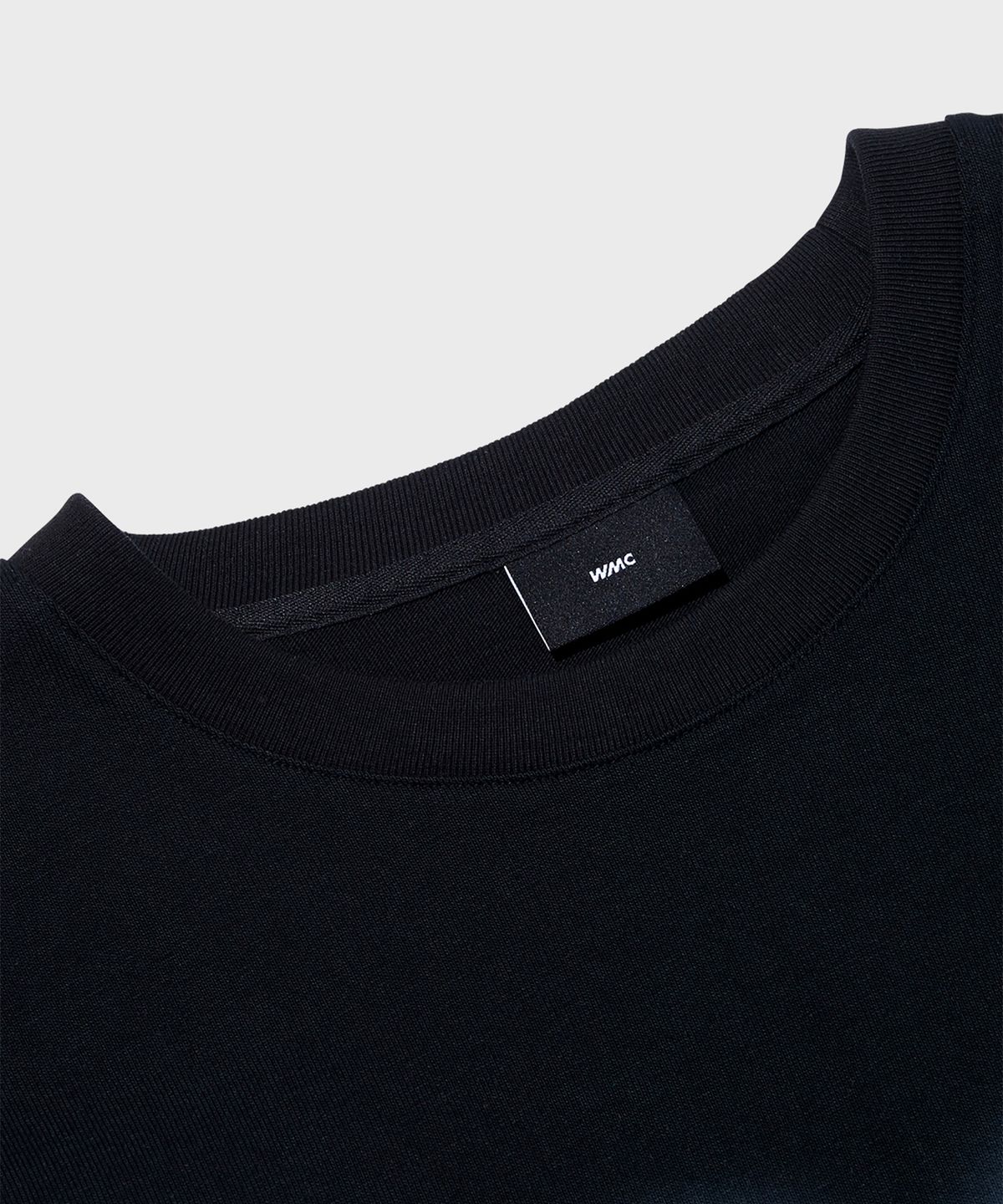 더블유엠씨(WMC) 일루젼 로고 티셔츠_BLACK