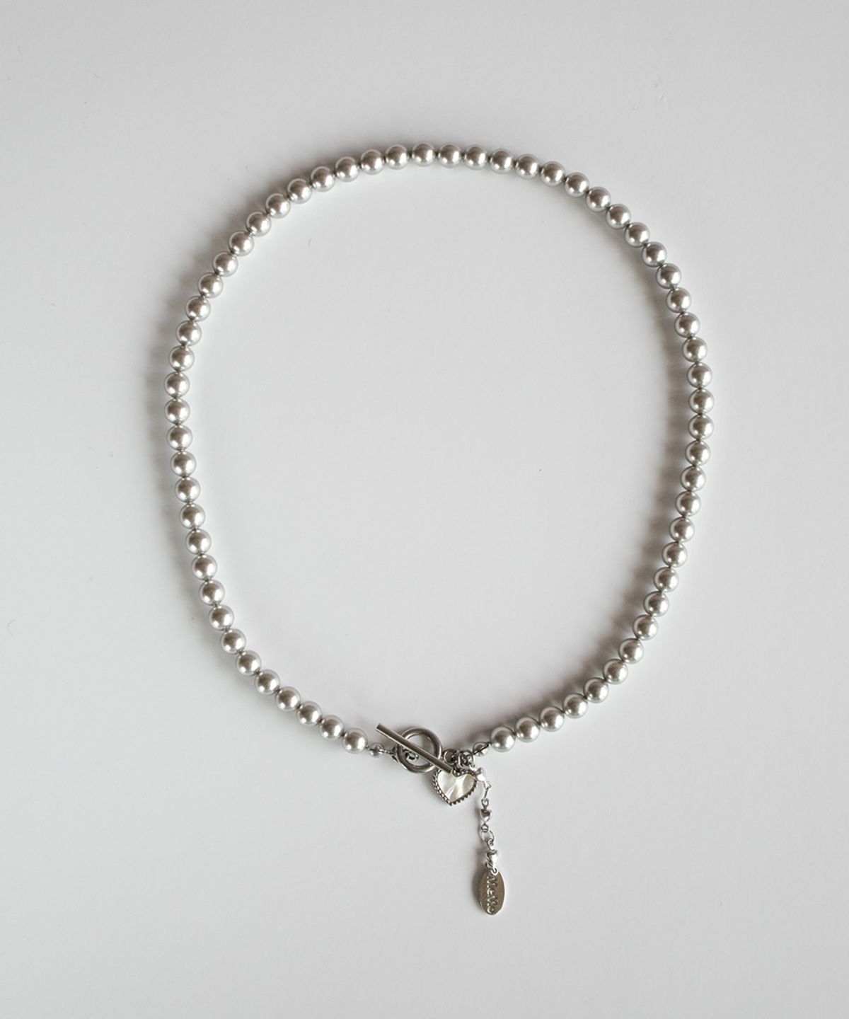 메리모티브(MERRYMOTIVE) Heart point silver pearl necklace