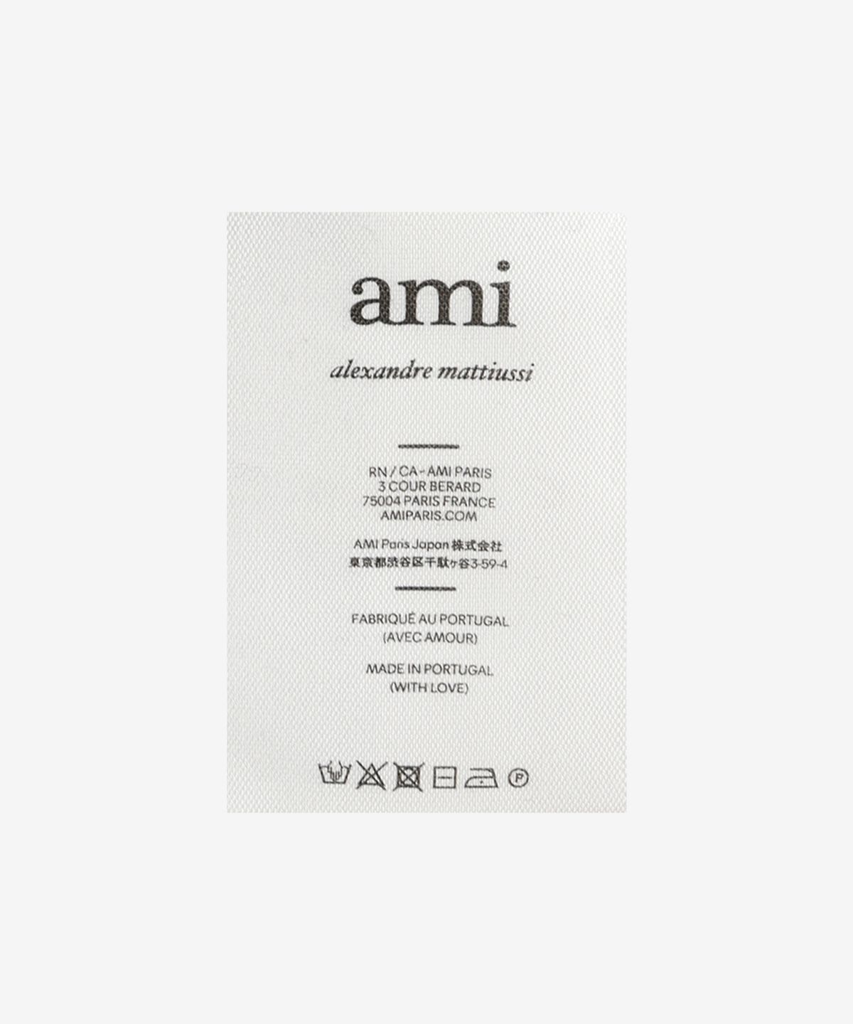 아미(AMI) 남성 하트 인타르시아 오버사이즈 울 터틀넥 니트 - 블랙 / UKS404018958