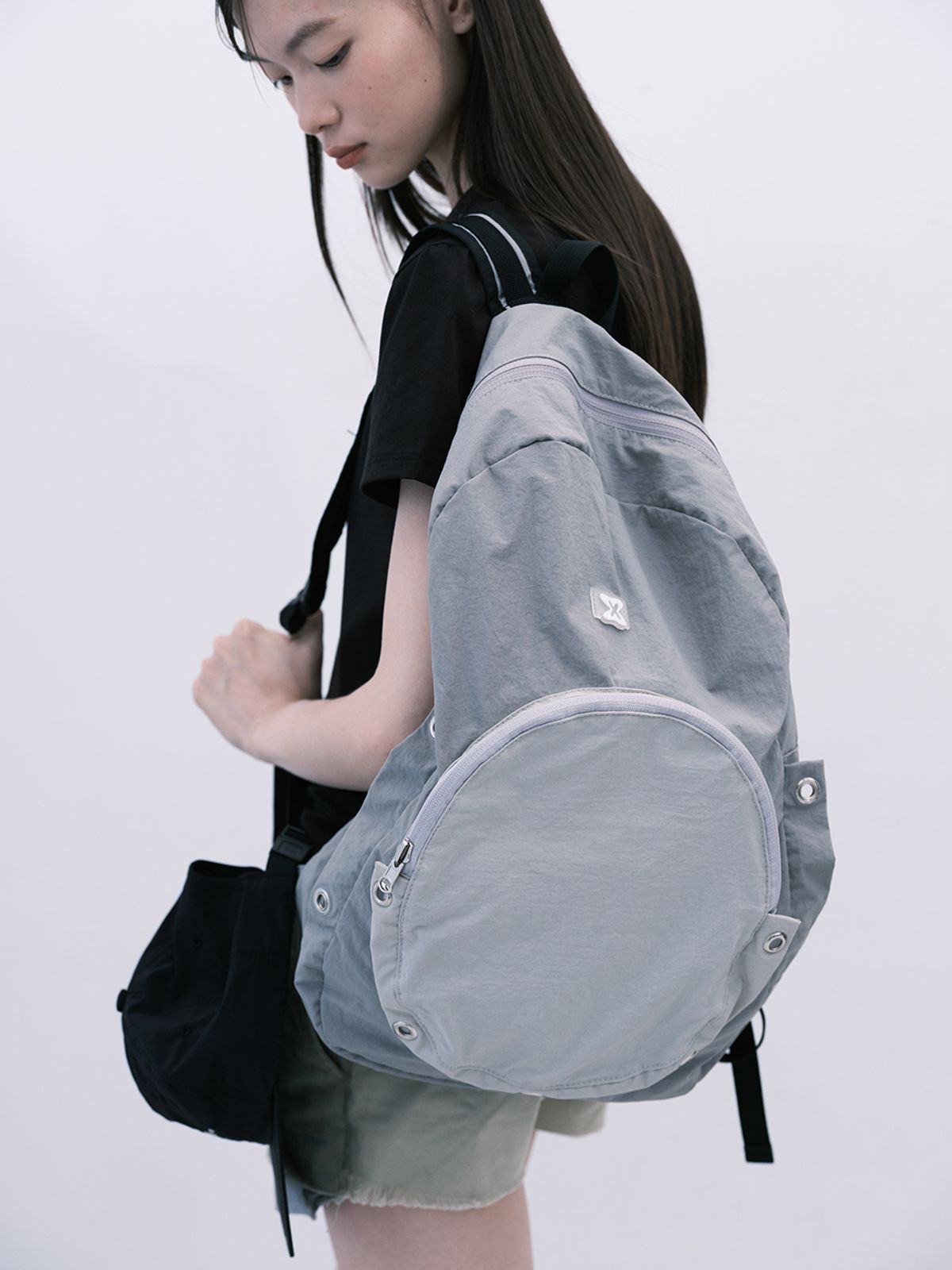 무음(MUWM) 네스트 나일론 아일렛 백팩 Nest Backpack (Gray)