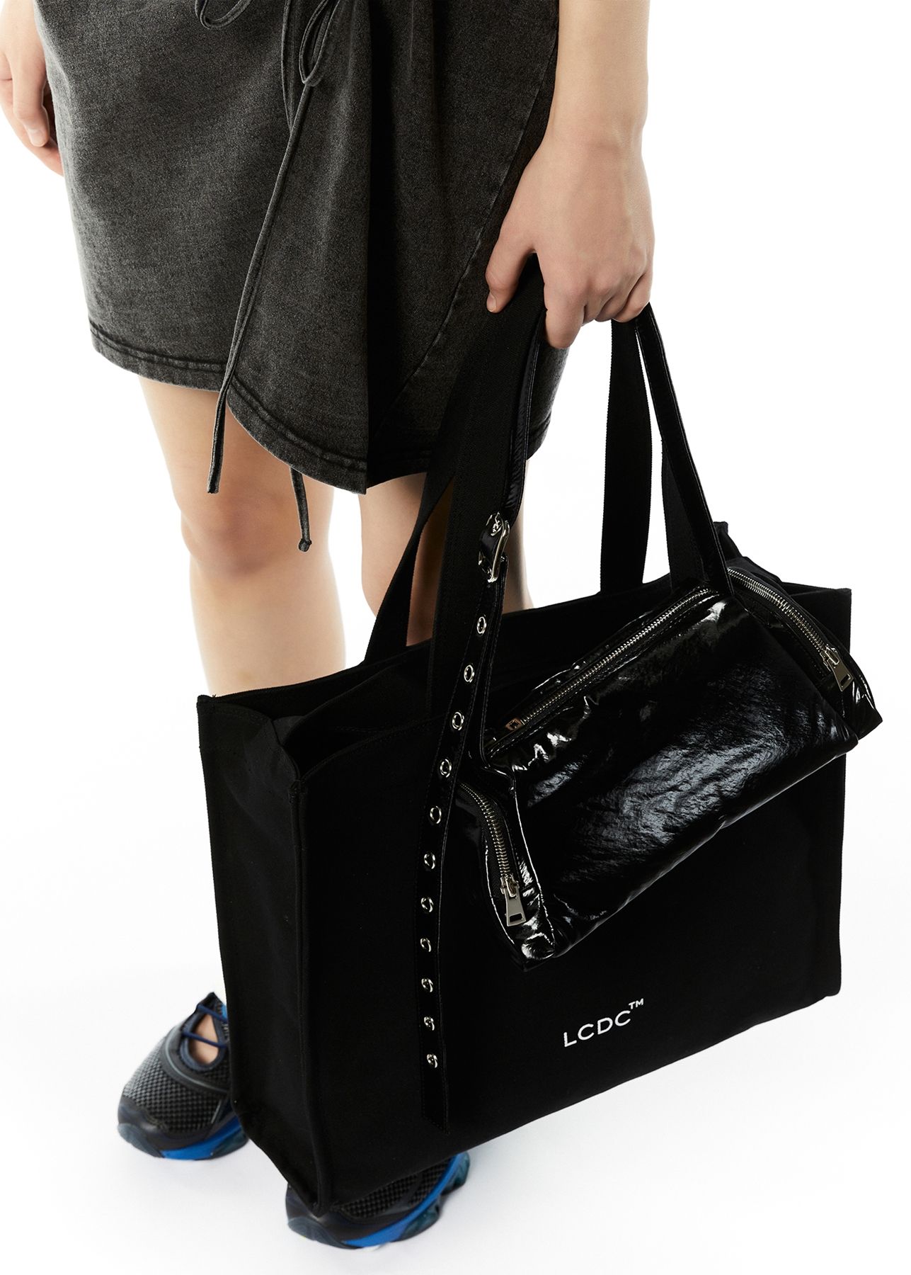 MUSINSA | LCDC TM EYELET BELT-STRAP BAG (BLACK/WHITE)