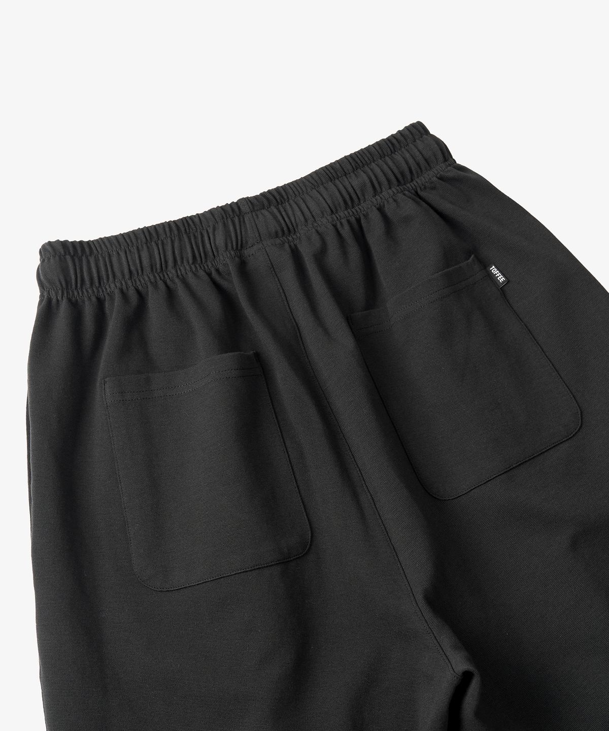 토피(TOFFEE) 원턱 하프 스웻 팬츠 (BLACK)