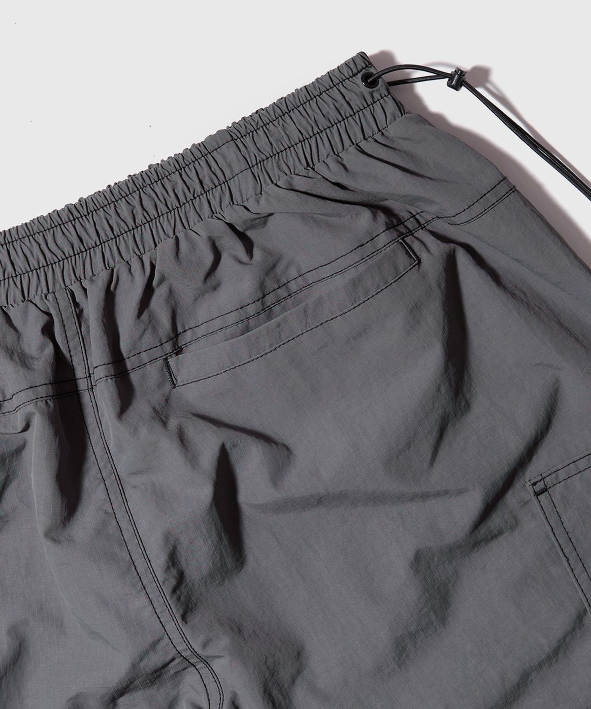 더블유엠씨(WMC) 립스탑 지퍼 카고팬츠_CHARCOAL GREY