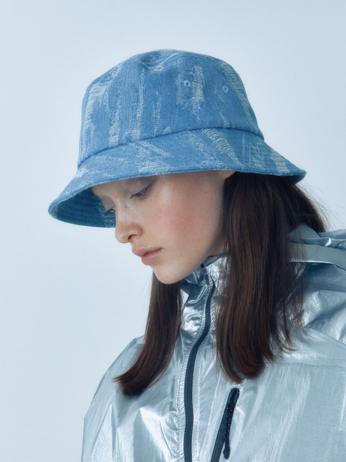 포에지담(POESIEDAME) DESTROYED DENIM BUCKET HAT IN LIGHT BLUE