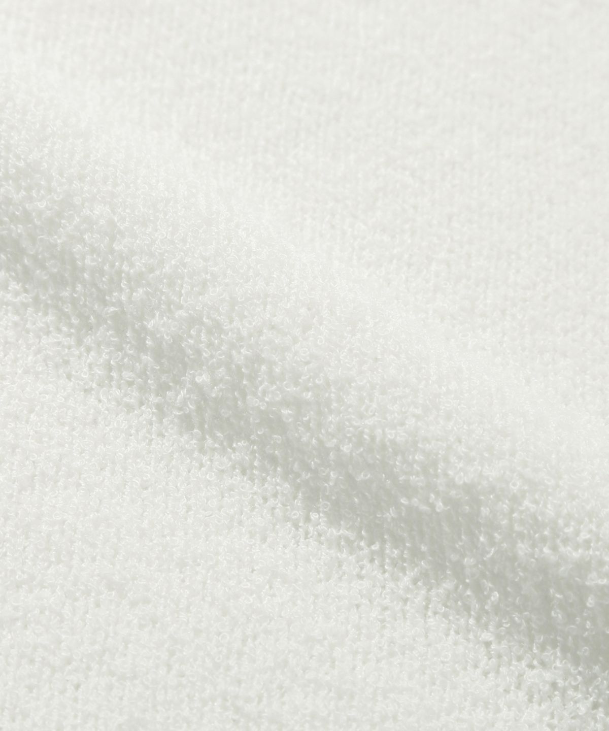 트릴리온(TRILLION) 워셔블 부클 카라 반팔 니트 (CREAM WHITE)
