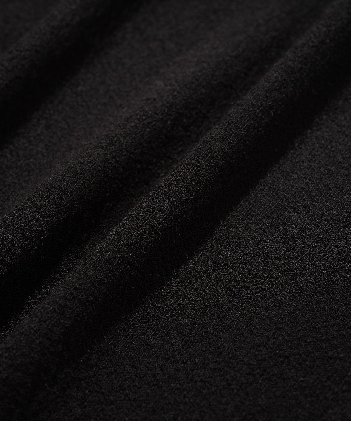 니티드(KNITTED) 썸머 바시티 반팔 니트티 BLACK
