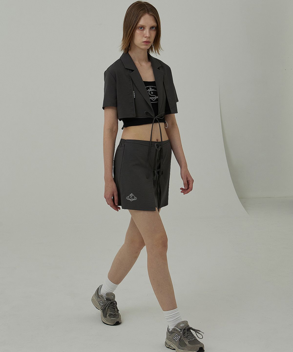플라즈마스페어(PLASMA SPHERE) APRON SKIRT IN GREY(랩 미니스커트)