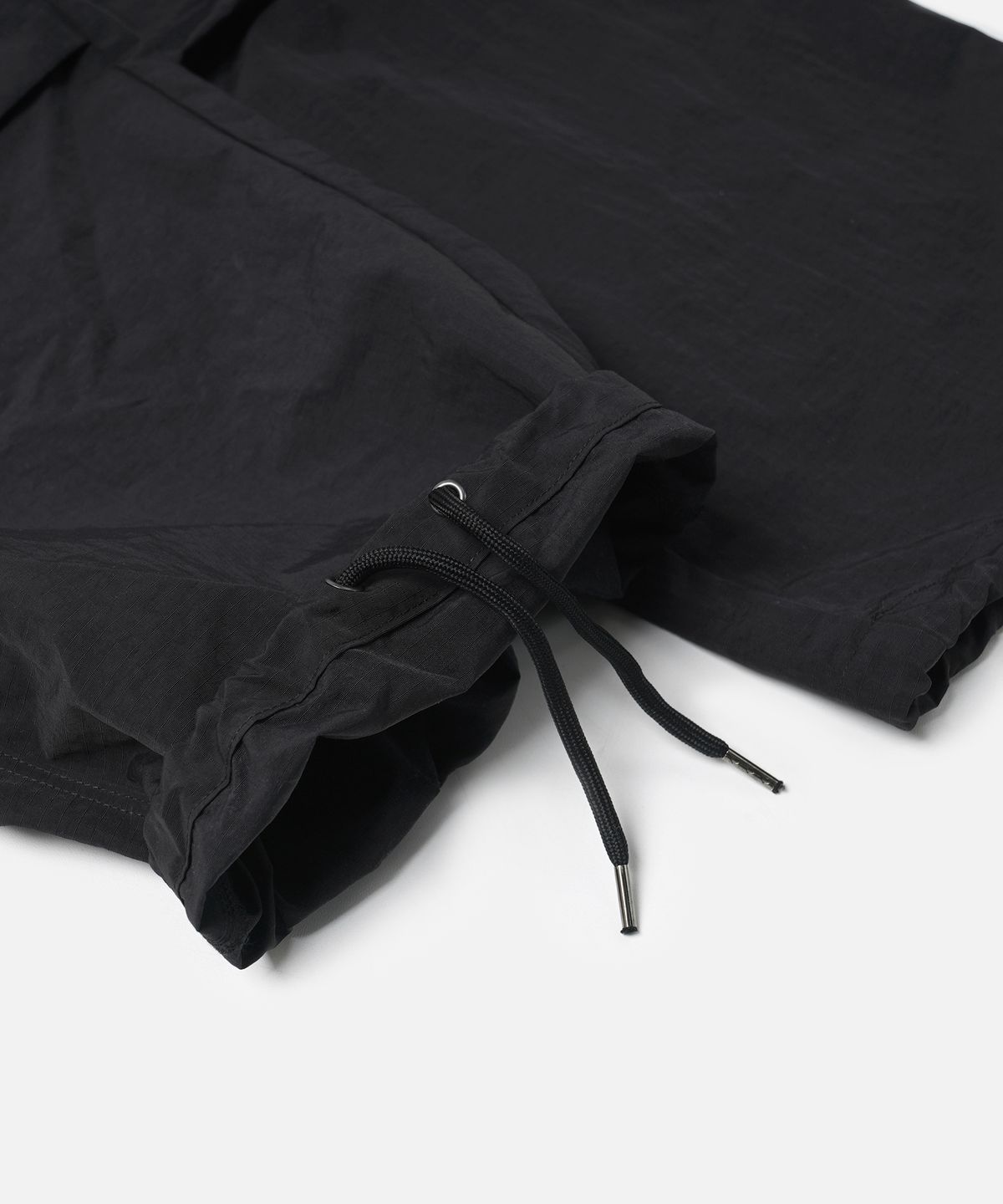 프리즘웍스(FRIZMWORKS) NYLON RIPSTOP PARACHUTE PANTS _ BLACK