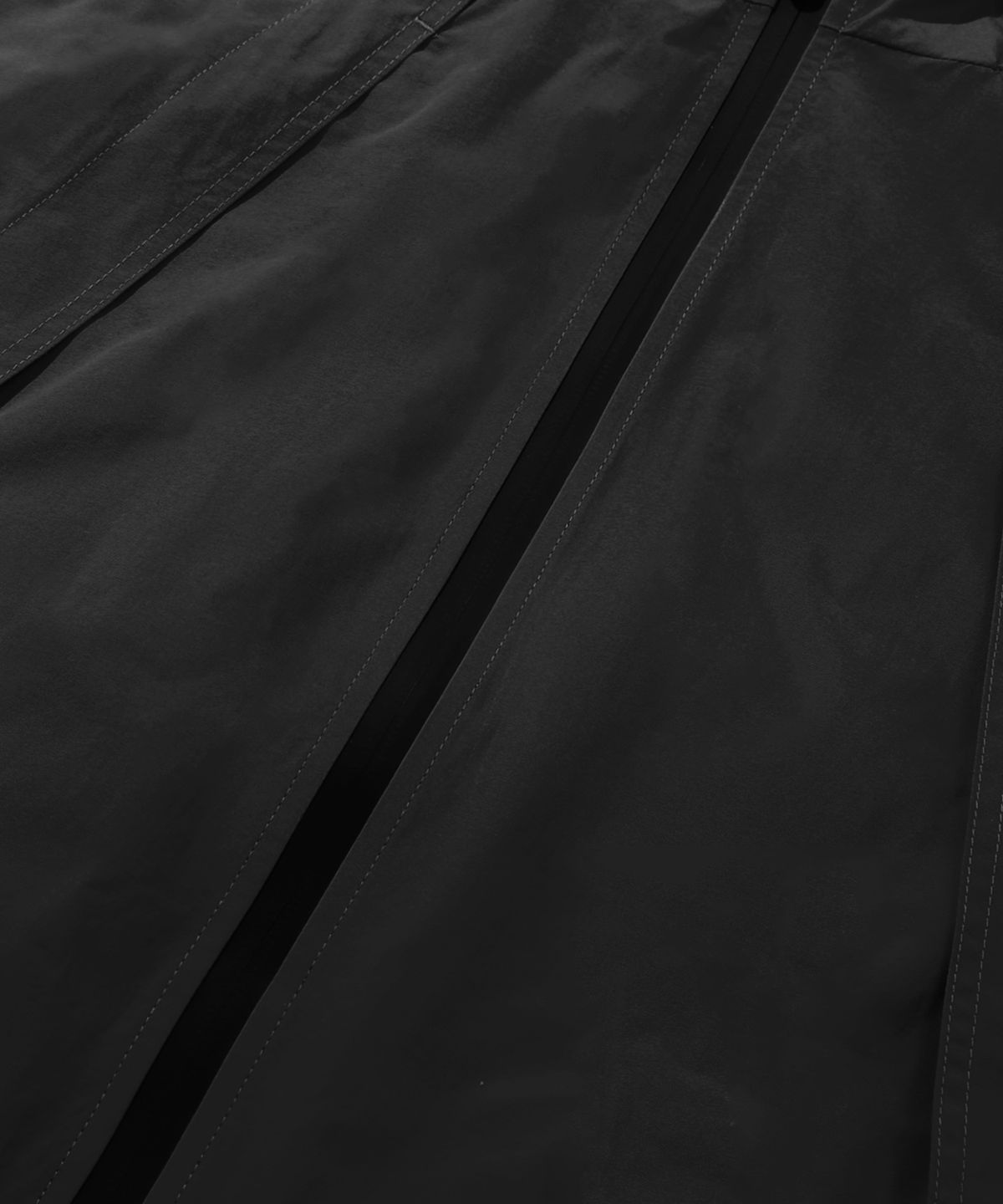 트릴리온(TRILLION) 디비전 나일론 후드 집업 베스트 (BLACK)