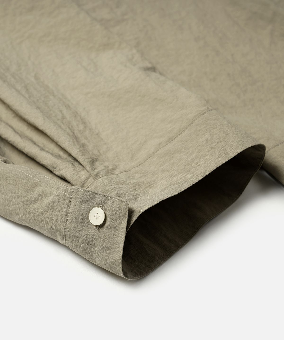 프리즘웍스(FRIZMWORKS) CURVED CUFFS PANTS _ BEIGE