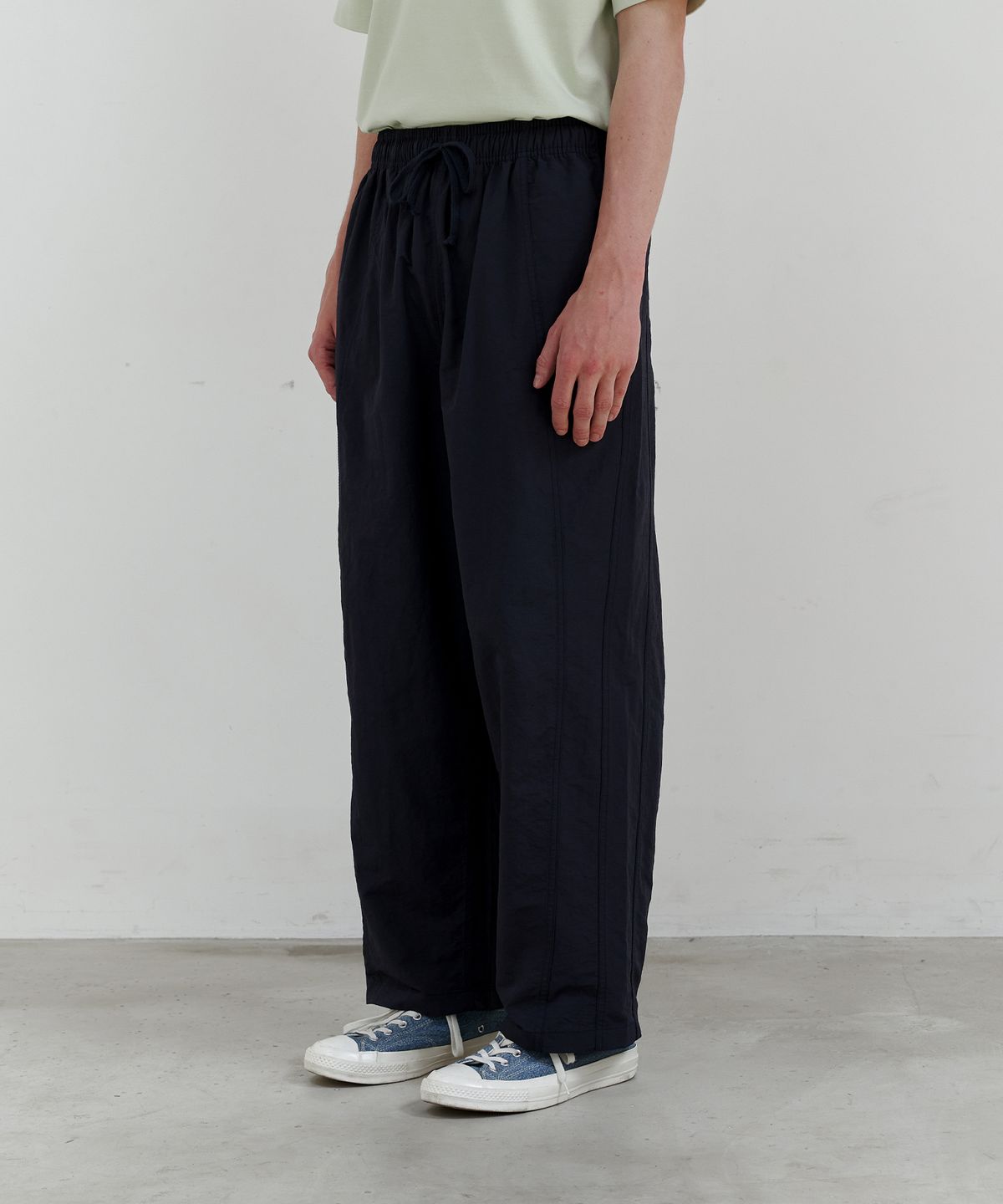 엔도어(ENDOOR) Twisted curved roll-up pants (navy)