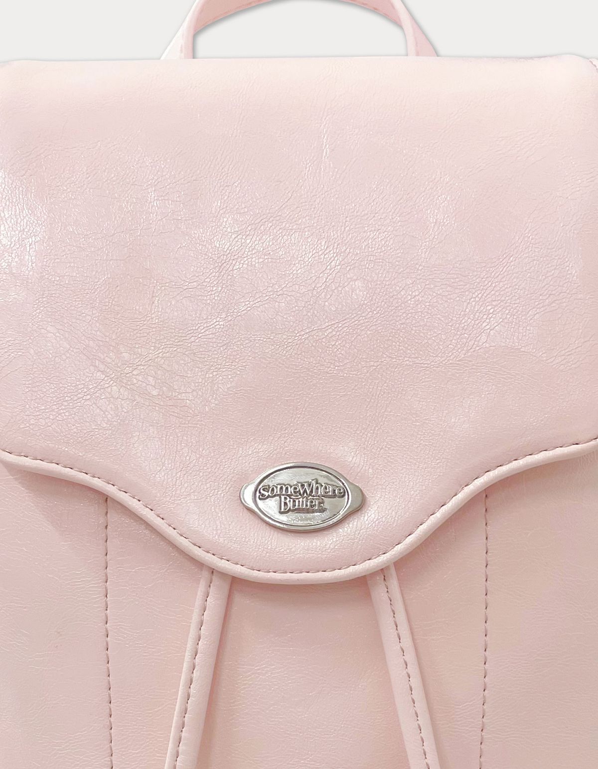 썸웨어버터(SOMEWHEREBUTTER) fle backpack - light pink