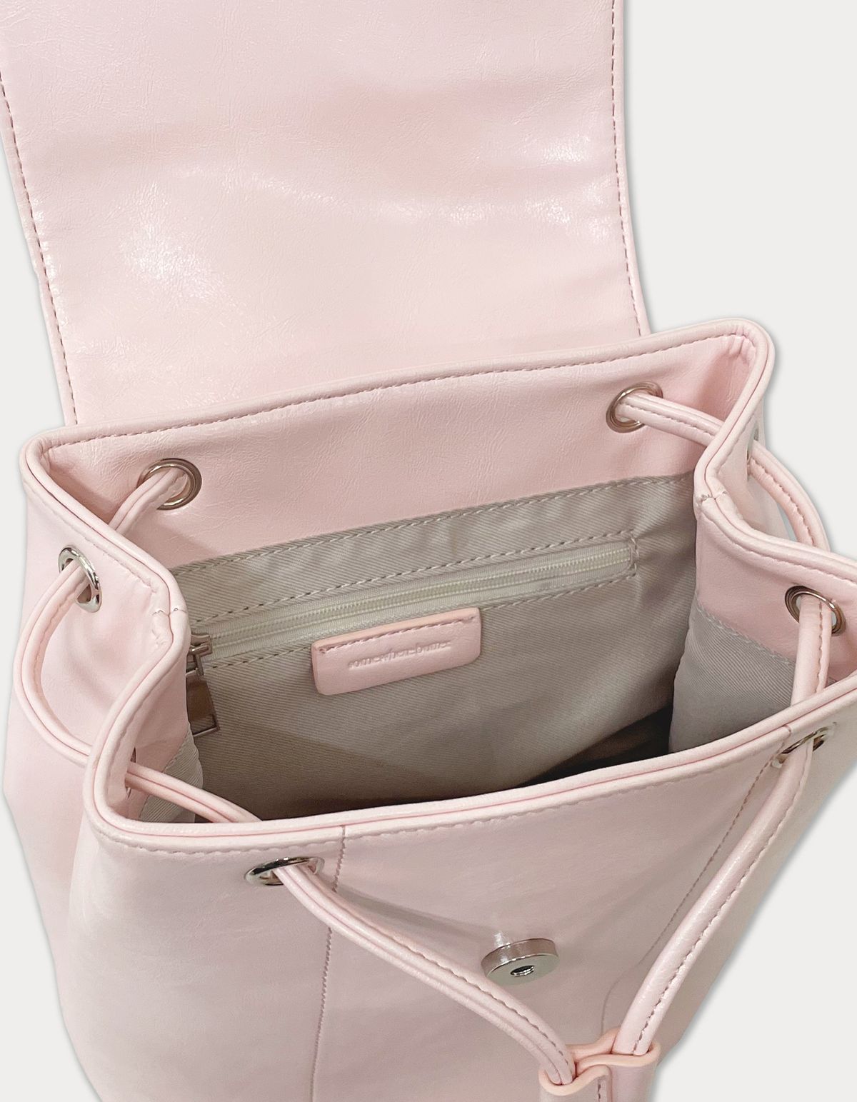 썸웨어버터(SOMEWHEREBUTTER) fle backpack - light pink