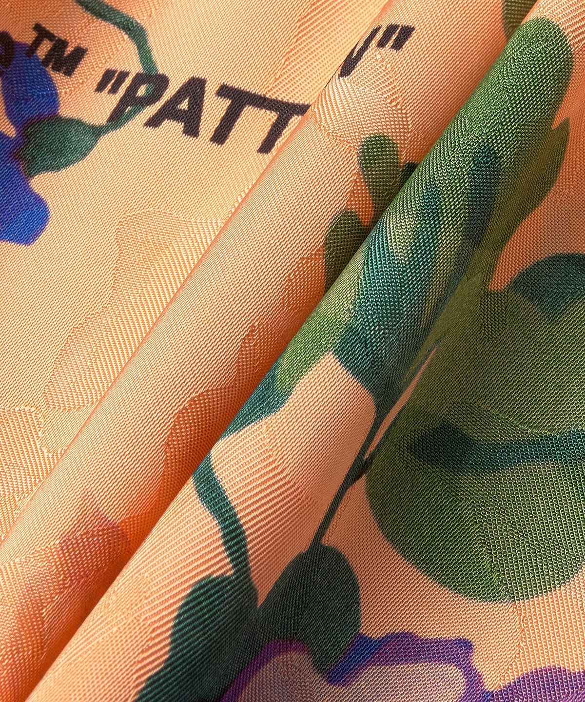 오프화이트(OFF-WHITE) 로고 패치 플로럴 프린트 숏팬츠 - 피치오렌지 / OWCB051S23FAB0032184
