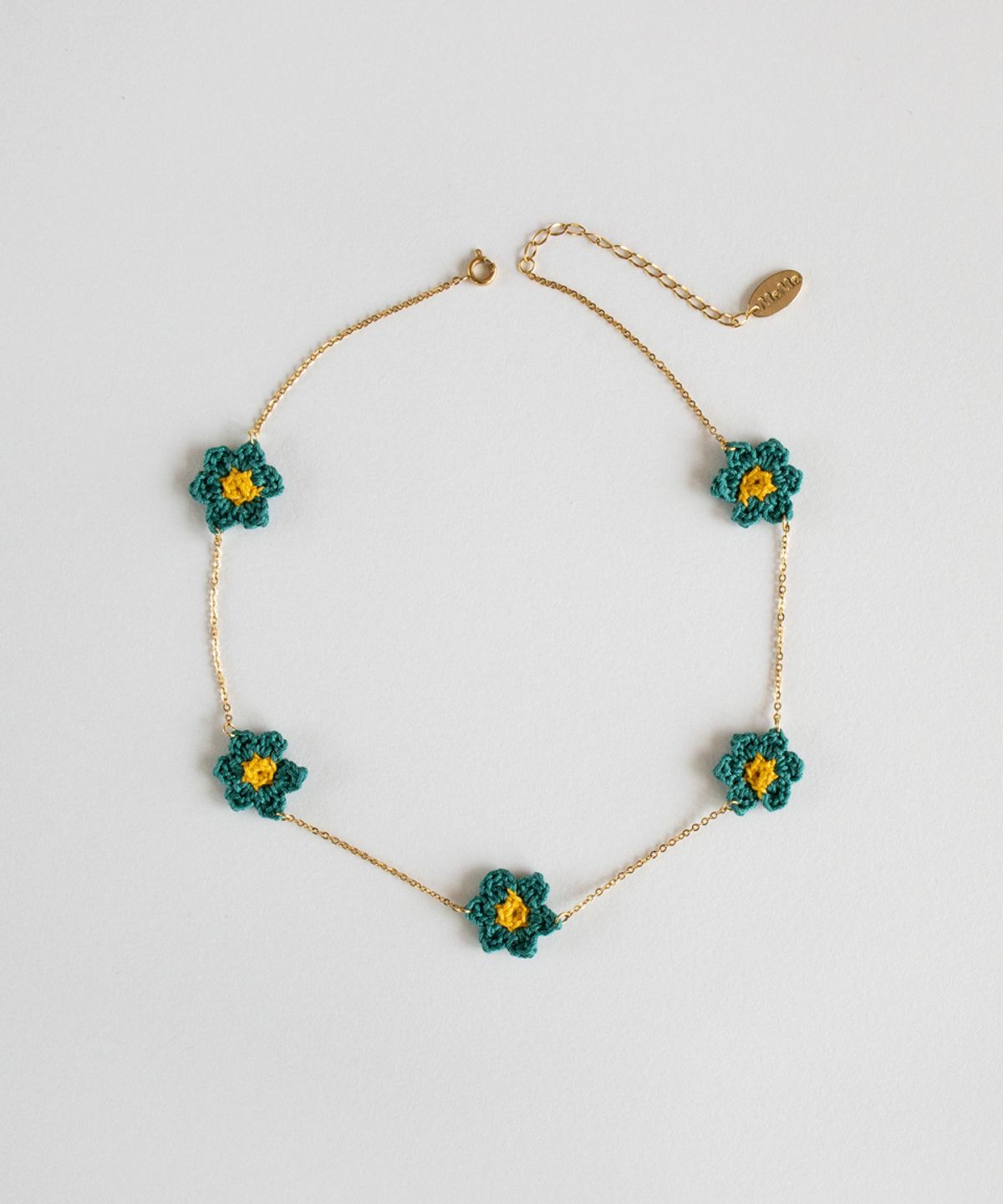 메리모티브(MERRYMOTIVE) Bluegreen flower point surgical necklace