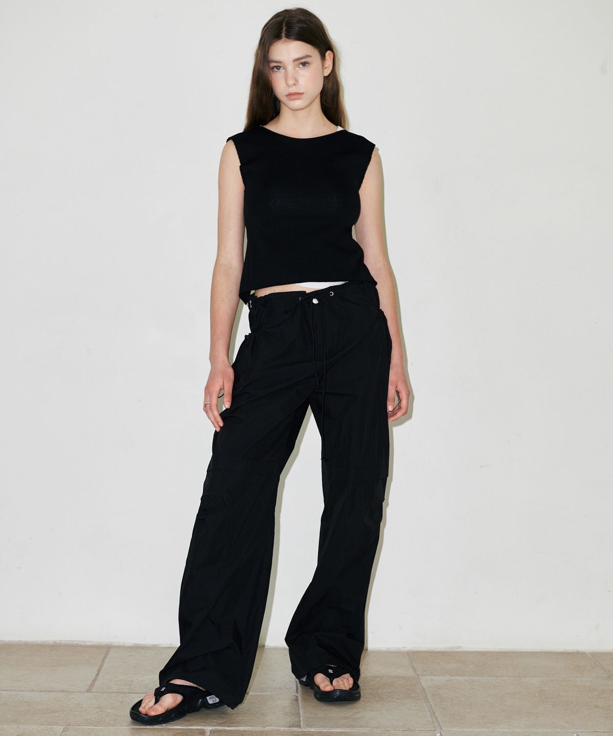 슬로우가먼츠(SLLOW GARMENTS) BACKLESS RIBBON POINT KNITWEAR - BLACK