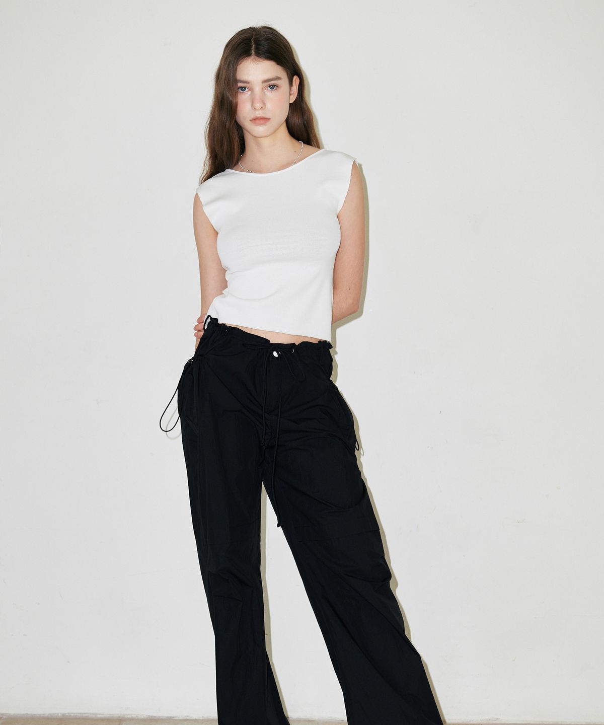 슬로우가먼츠(SLLOW GARMENTS) BACKLESS RIBBON POINT KNITWEAR - WHITE