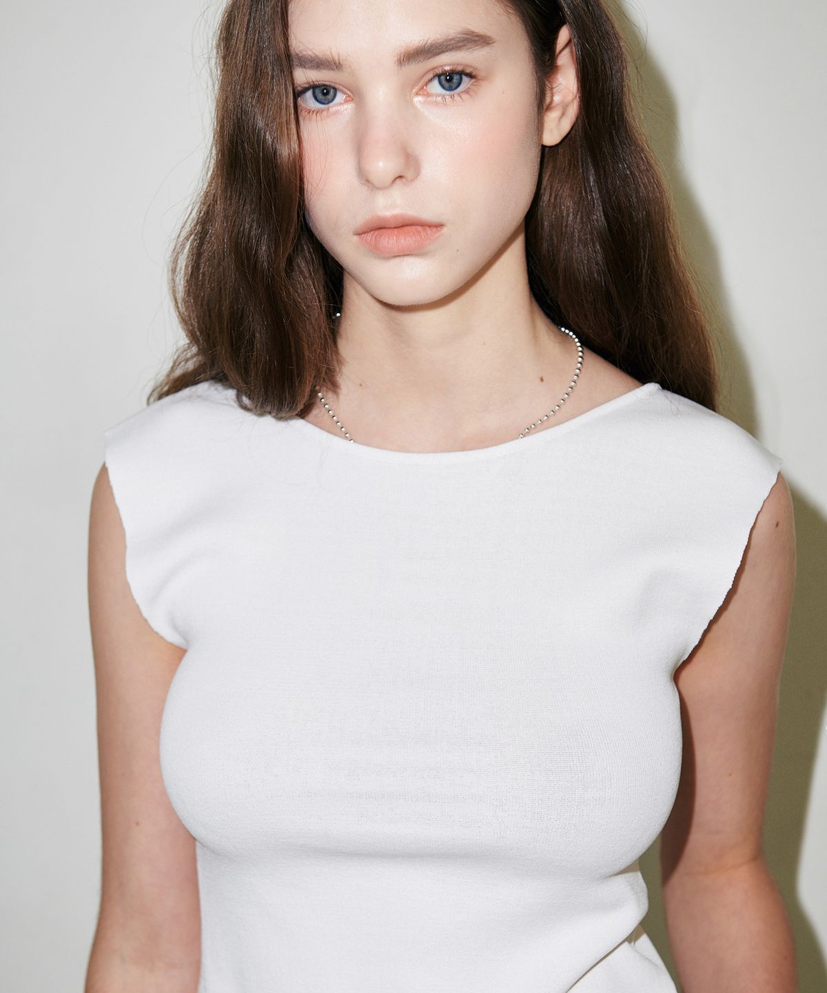 슬로우가먼츠(SLLOW GARMENTS) BACKLESS RIBBON POINT KNITWEAR - BLUE