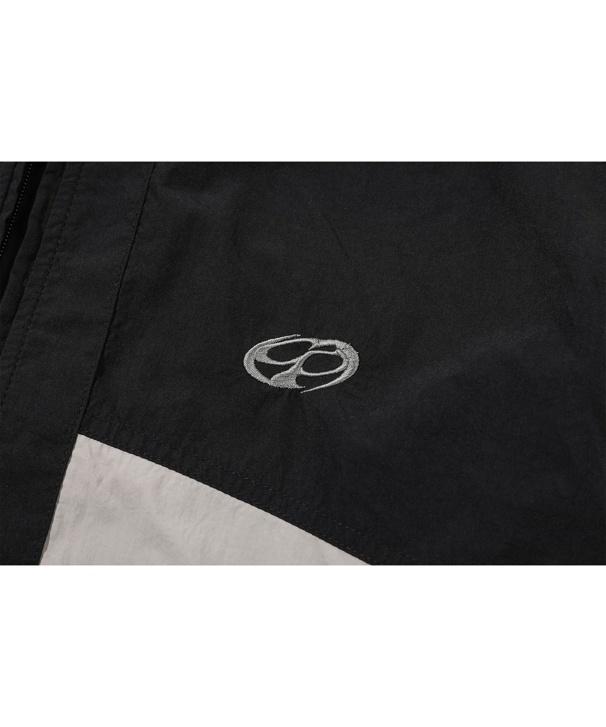 꼼파뇨(CPGN STUDIO) 크래킹 후드 윈드브레이커 블랙
