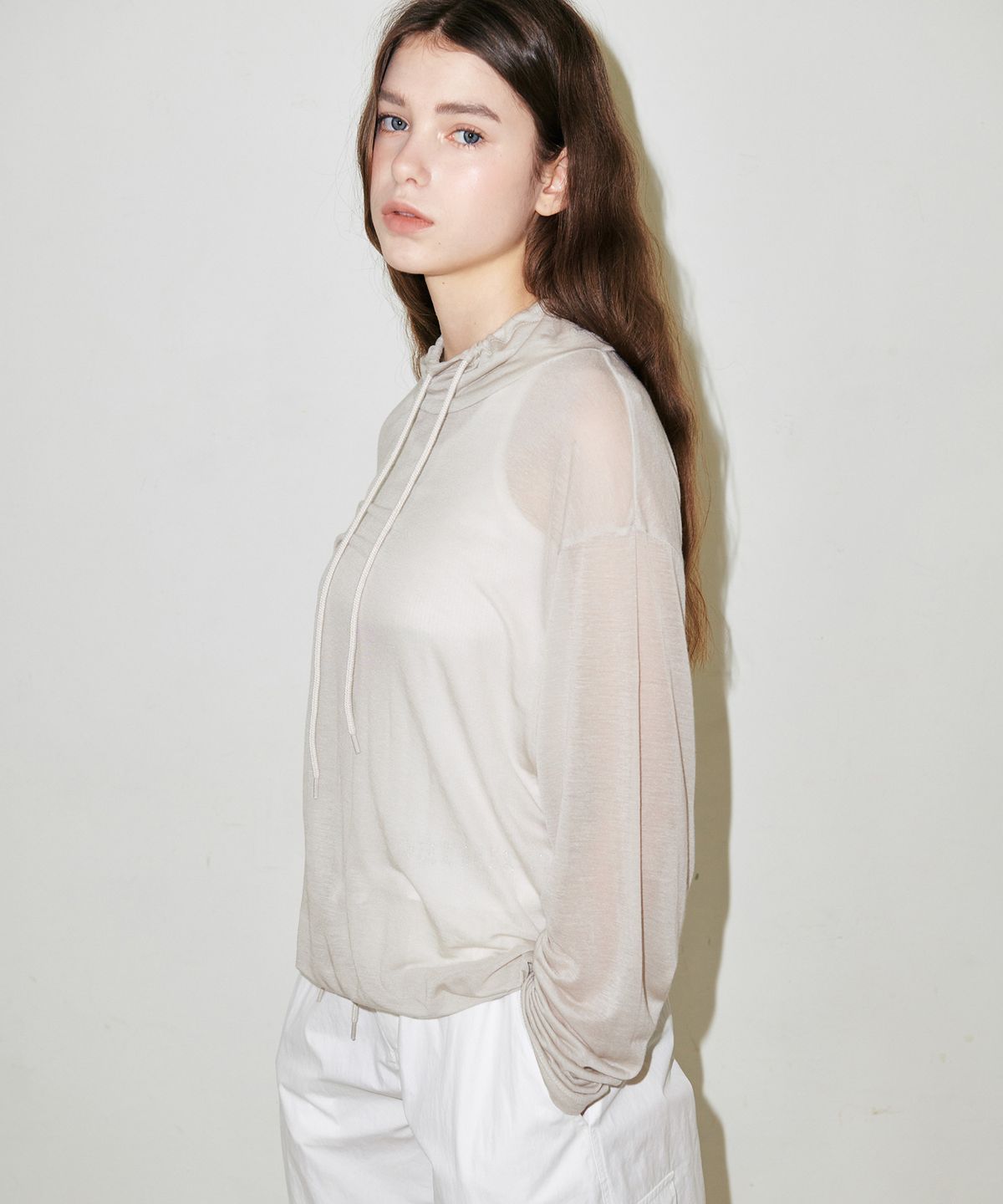 슬로우가먼츠(SLLOW GARMENTS) HIGH NECK STRING LONG-SLEEVED SEE-THROUGH T-SHIRT - BLACK