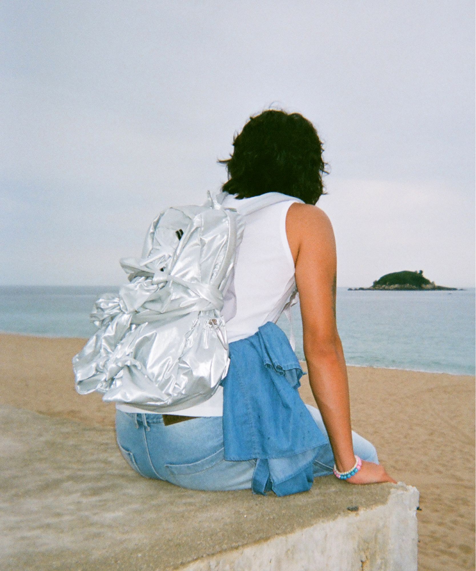 MUSINSA | IUGAMAKARAS Knotted Backpack v2 (Glossy-Silver)