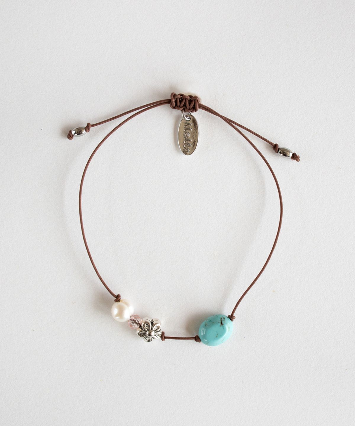 메리모티브(MERRYMOTIVE) Vintage brown knot bracelet