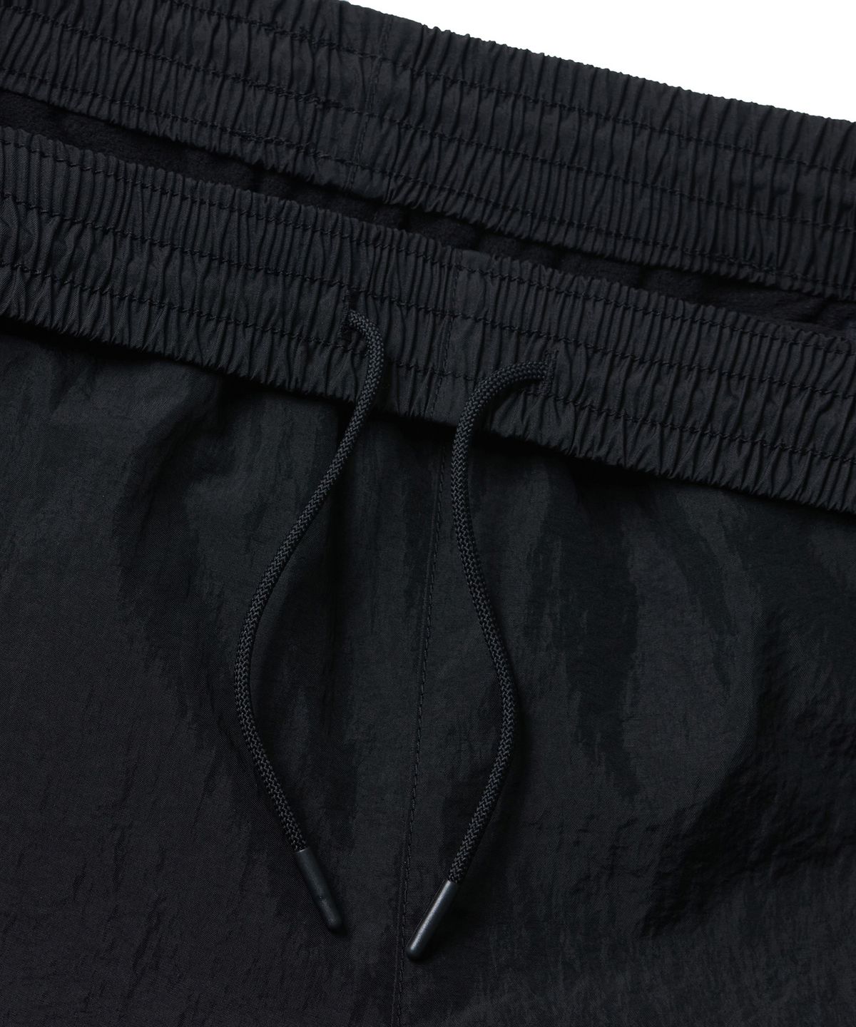 무신사 스탠다드(MUSINSA STANDARD) 속기모 나일론 와이드 스트링 팬츠 [블랙]