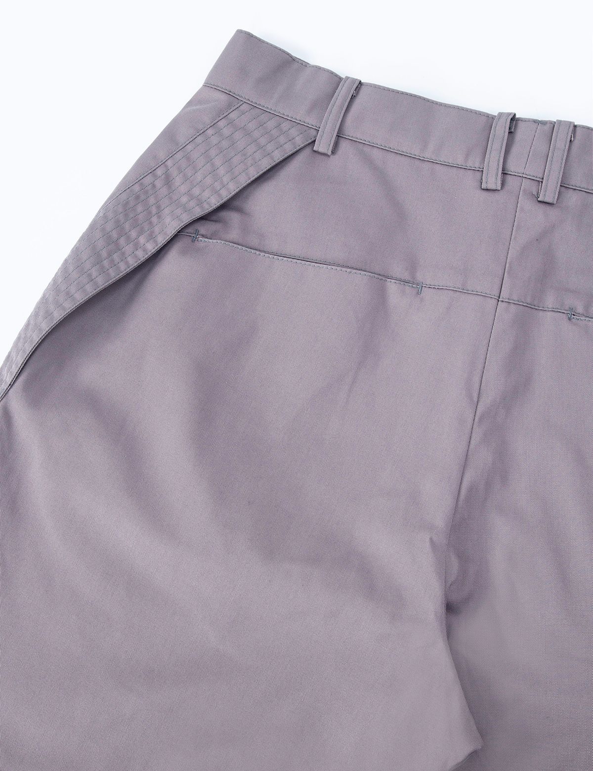 이레귤러(IRREGULAR) VANE FLAP PANTS (ASHED LILAC)