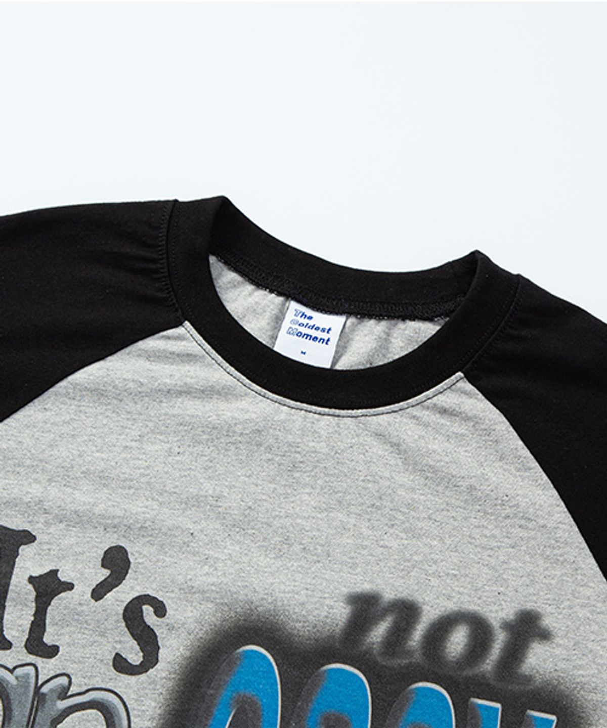 더콜디스트모먼트(THE COLDEST MOMENT) TCM not easy raglan long sleeve (grey/black)