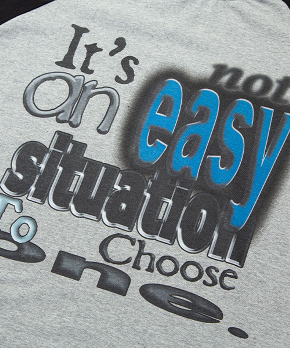 더콜디스트모먼트(THE COLDEST MOMENT) TCM not easy raglan long sleeve (grey/black)
