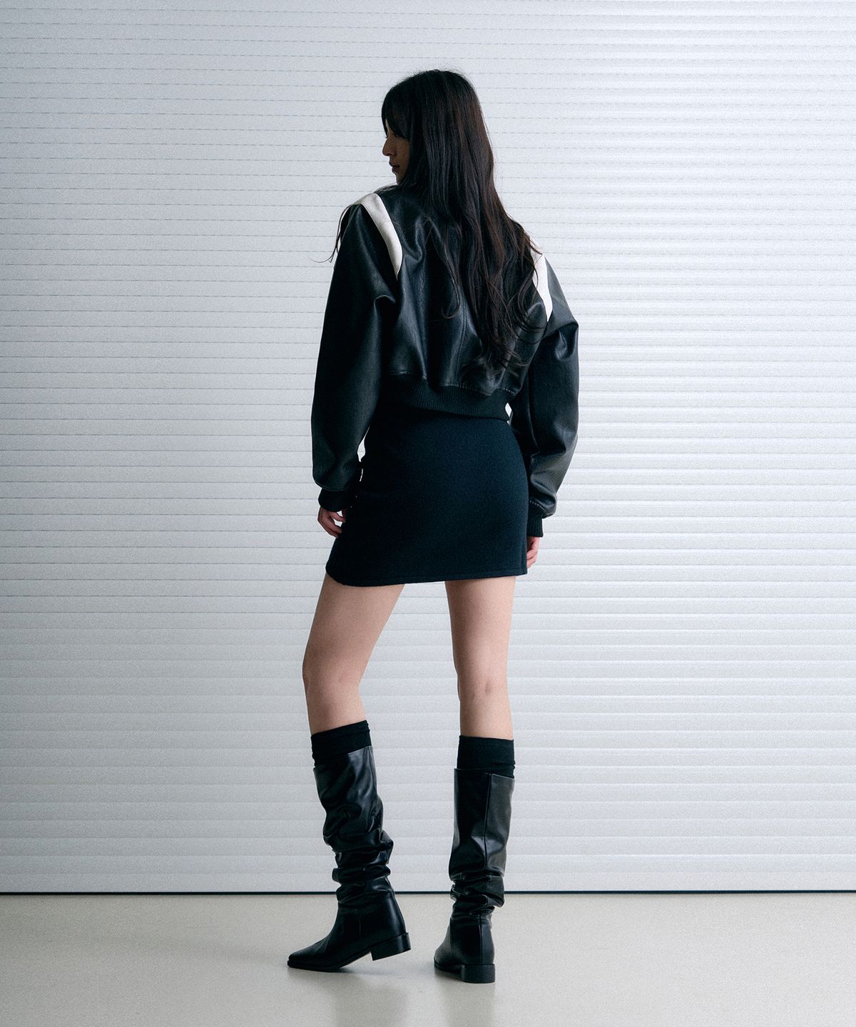레더리(LEATHERY) 라인 케이블 니트 미니 스커트 [BLACK]