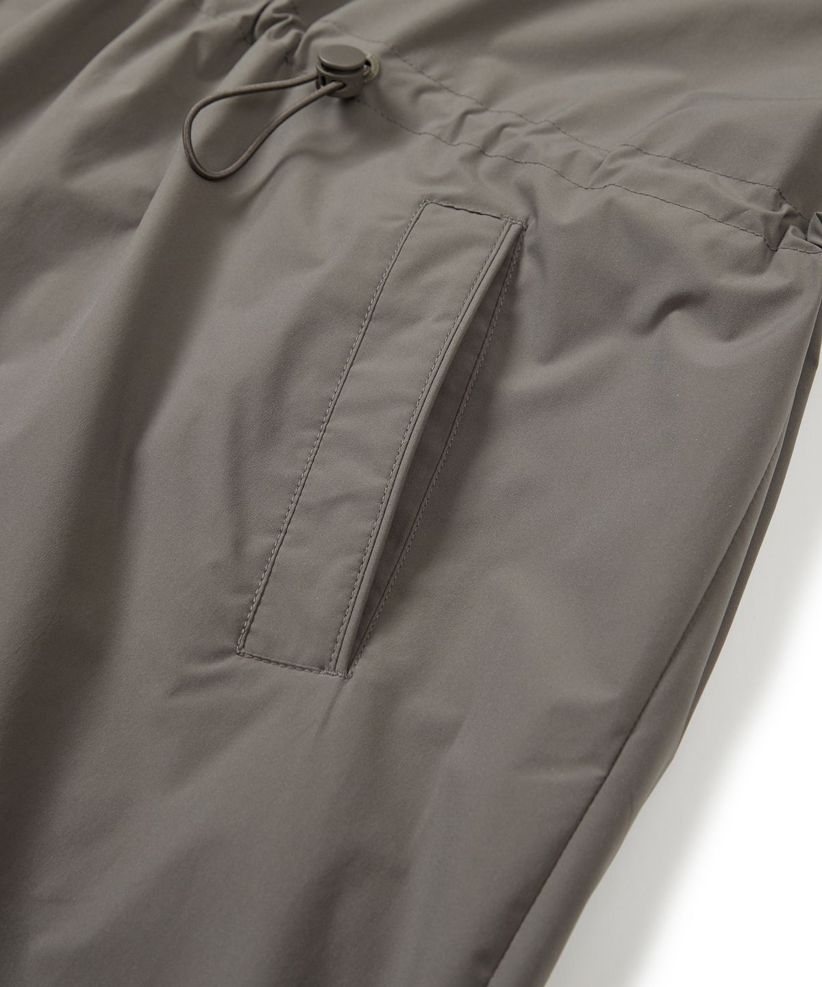 스노우피크 어패럴(SNOWPEAK APPAREL) 프로 우먼스 중기장 후드 아노락 Dark Khaki (S23FWTAN31)