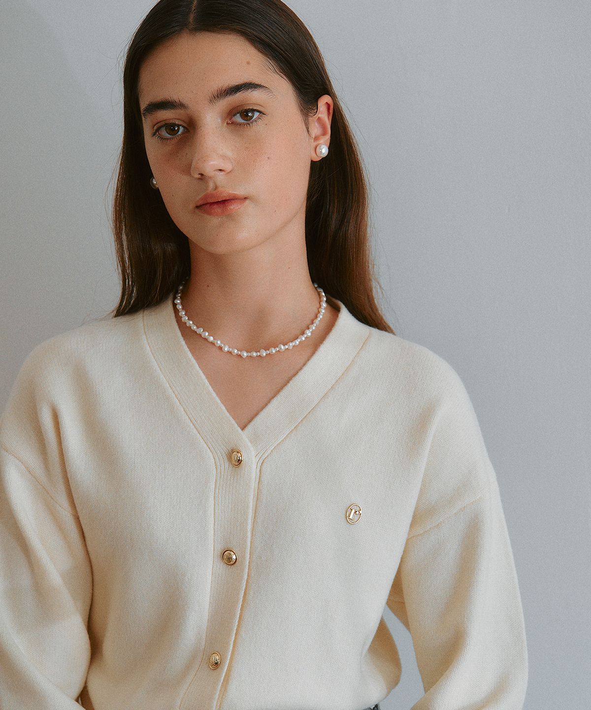 로라로라(ROLAROLA) WOOL BLENDED BASIC CARDIGAN IVORY