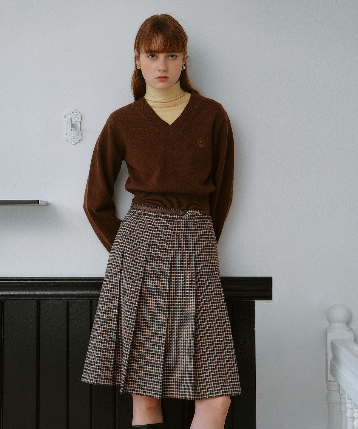 로라로라(ROLAROLA) WOOL BLENDED BUCKLE PLEATS SKIRT BROWN